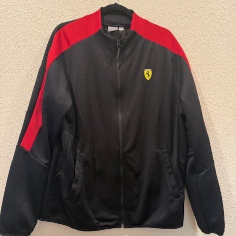 Puma Black Jacket with Red Accents and Yellow Logo